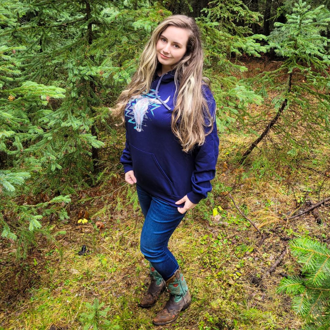 Cowgirl wearing a Navy blue western hoodie!